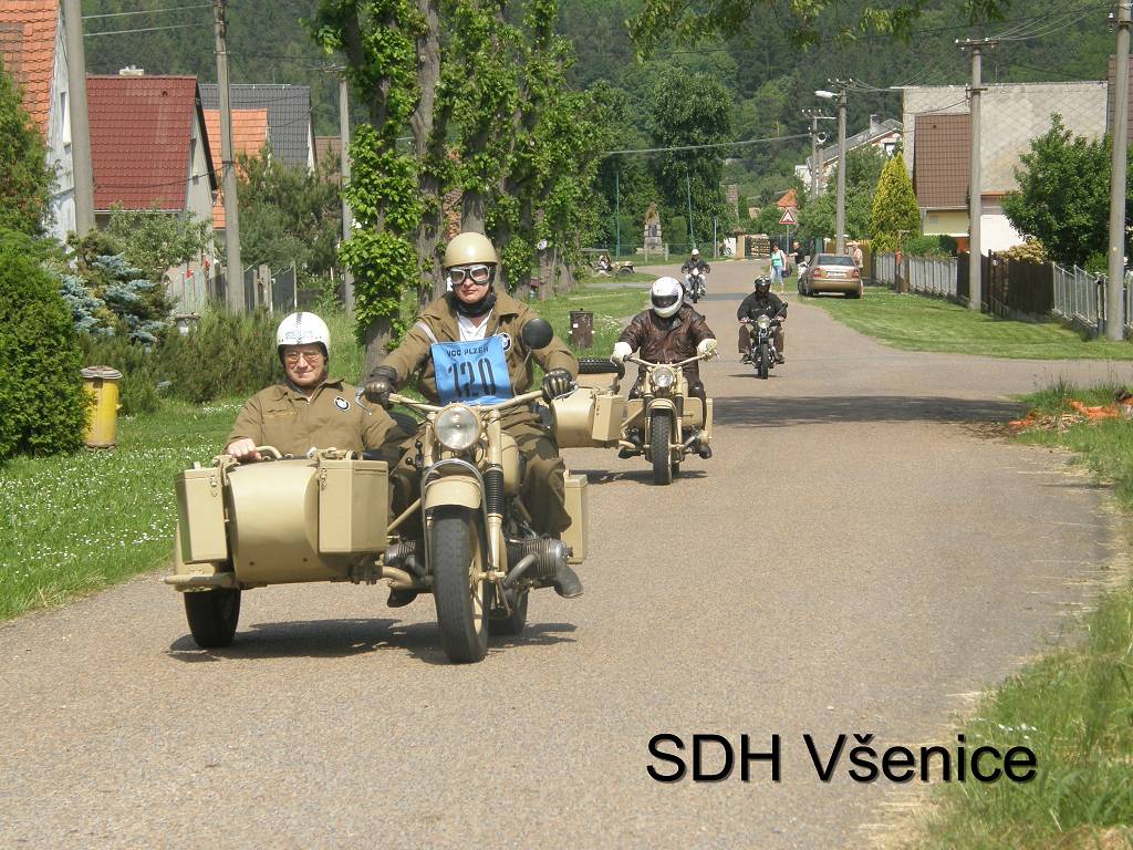 závodníci